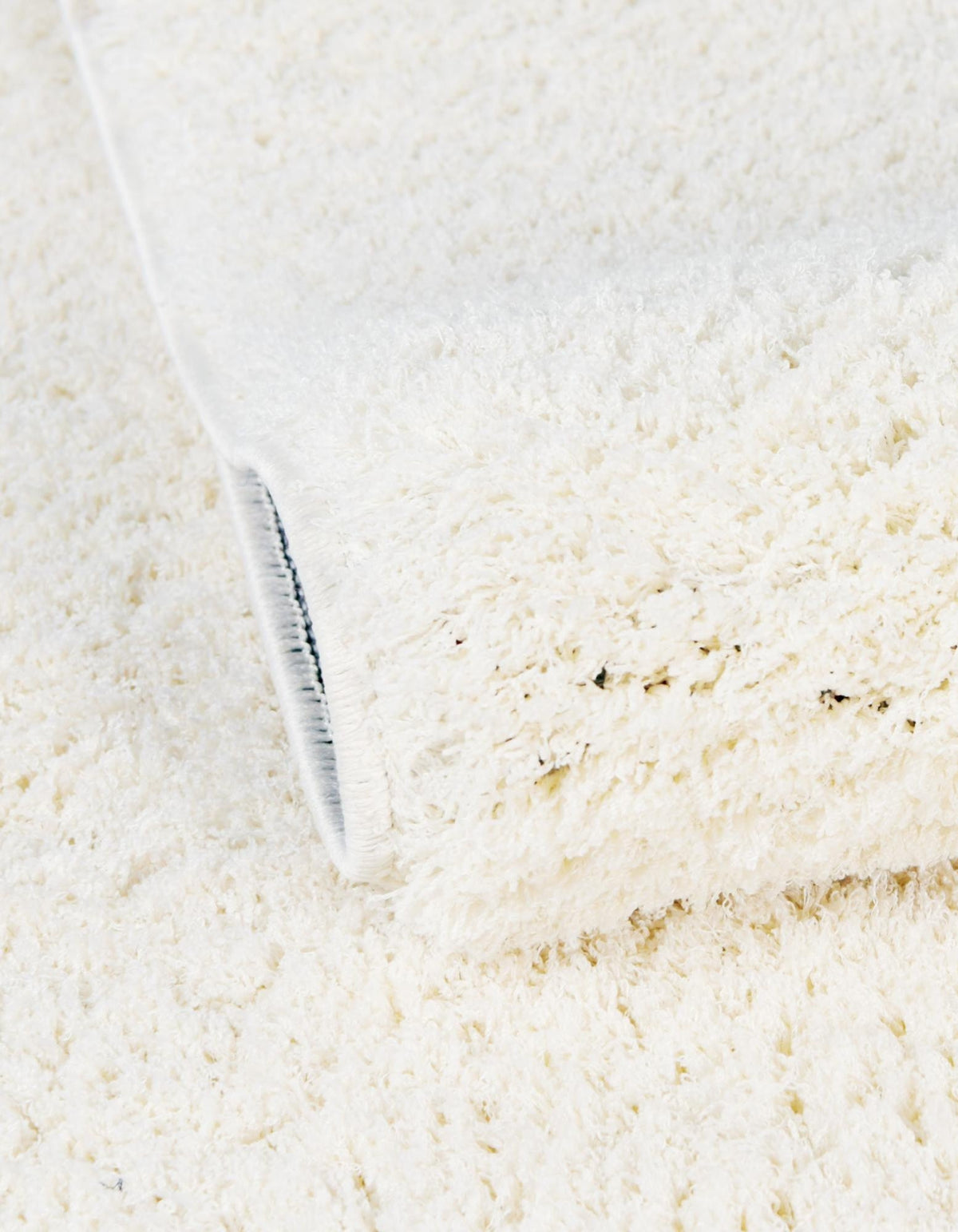 Quadratisch Teppich Luzern in Weiss von Hadorn™ - Lifestyle Image