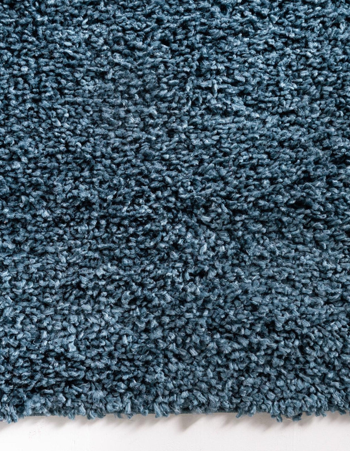 Quadratisch Hochflorteppich Zermatt Shag in Blau von Hadorn™ - Lifestyle Image