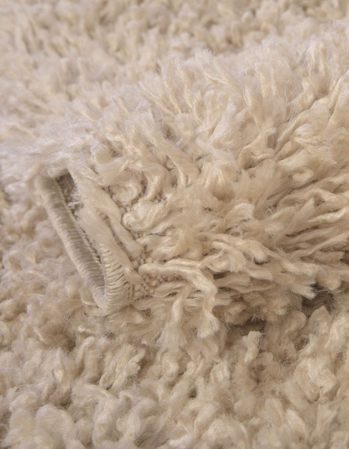 Quadratisch Hochflorteppich Zermatt Shag in Beige von Hadorn™ - Lifestyle Image