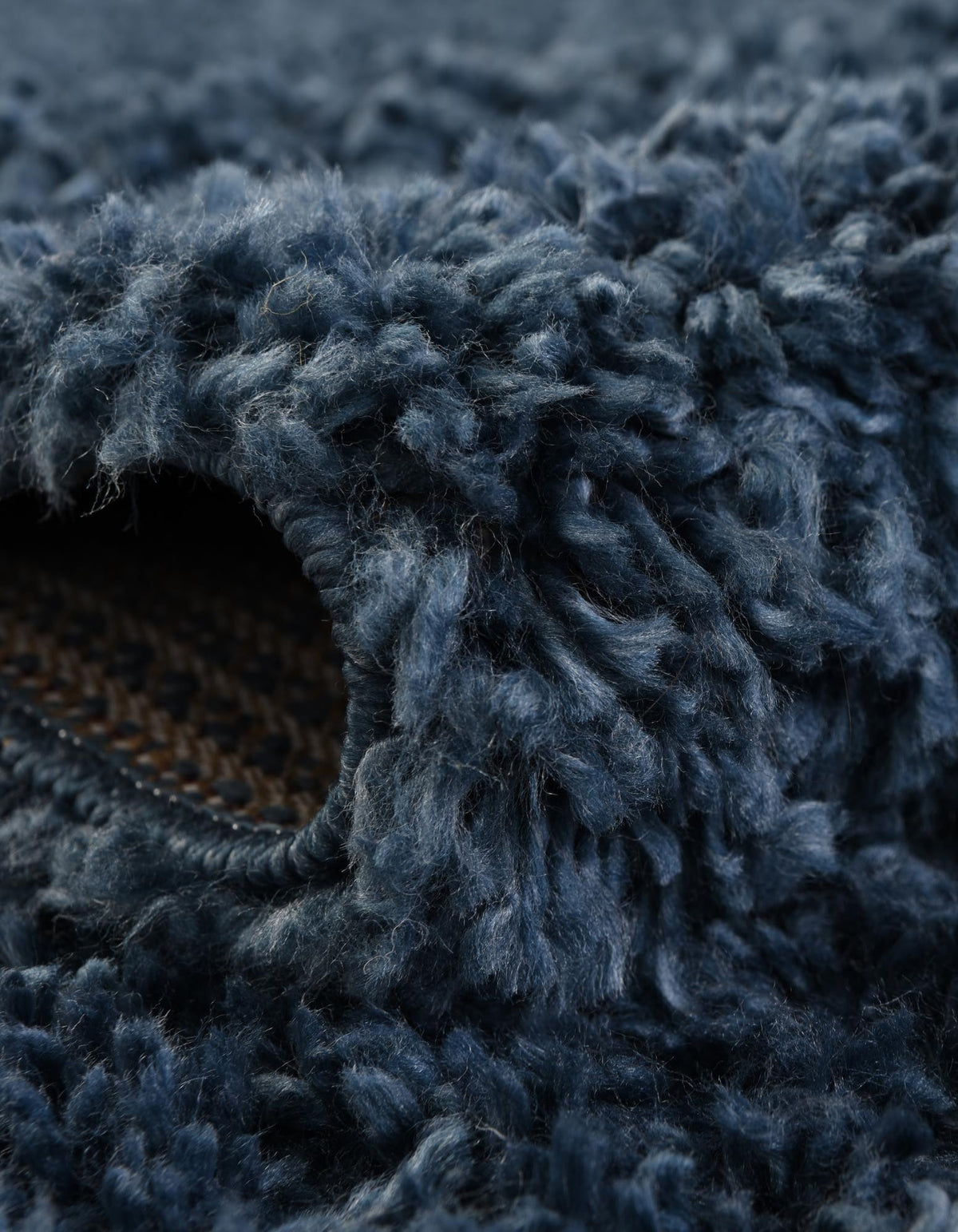 Quadratisch Hochflorteppich Zermatt Shag in Blau von Hadorn™ - Lifestyle Image