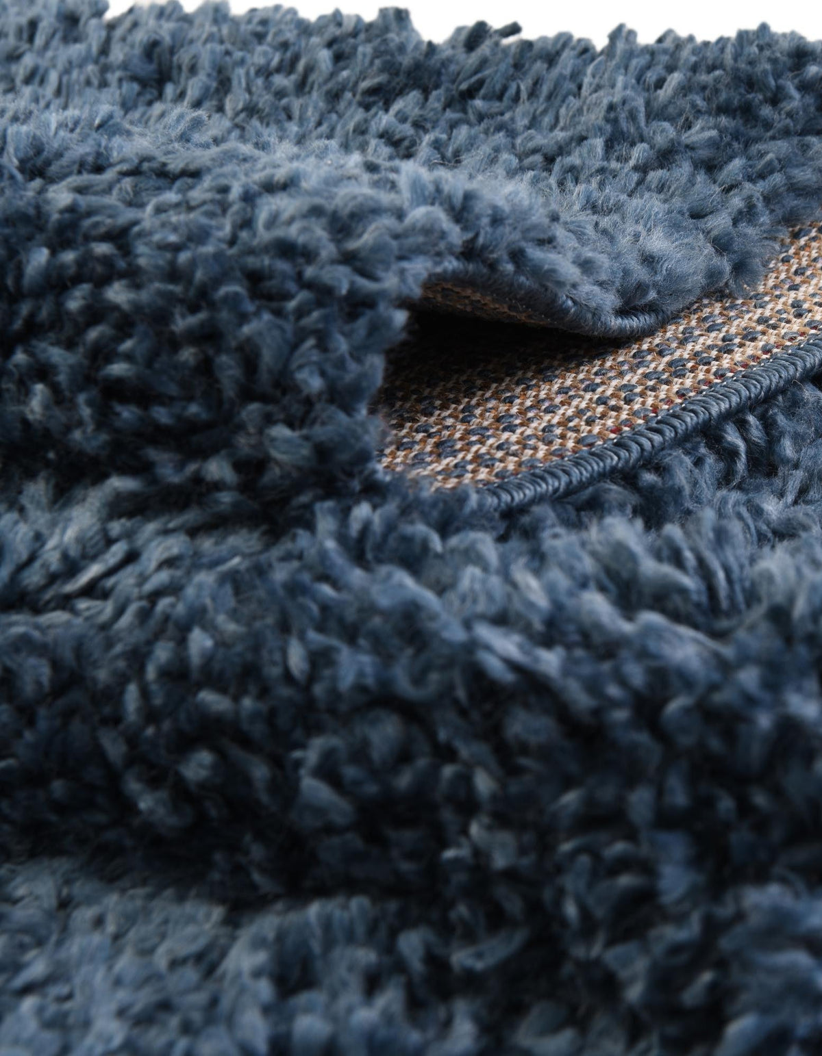 Quadratisch Hochflorteppich Zermatt Shag in Blau von Hadorn™ - Lifestyle Image