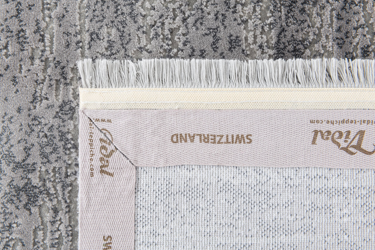Rund Luxus Teppich Chiasso in Blau von Hadorn™ - Lifestyle Image