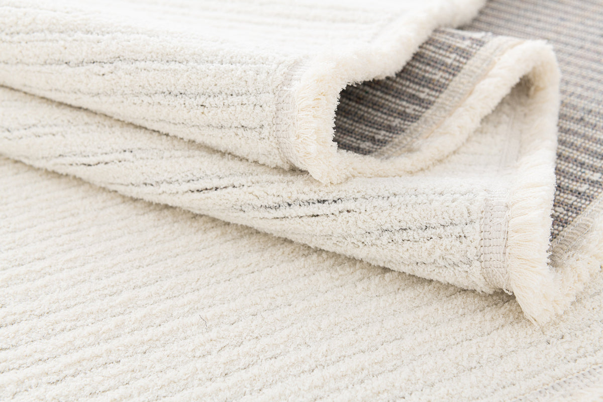 Rechteck Teppich St. Gallen Folklore in Weiss von Hadorn™ - Lifestyle Image