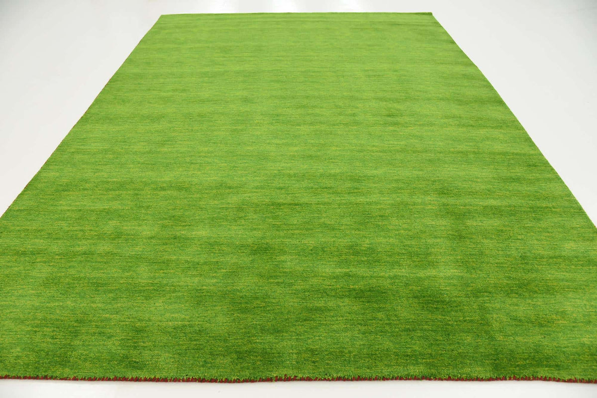 Wolle Teppich Solid Gabbeh in Hellgrün von Hadorn™ - Lifestyle Image